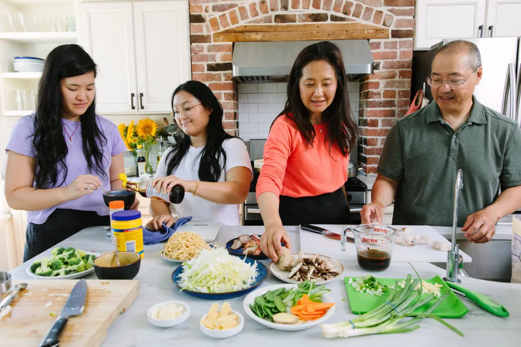 The Leung family cooking in the kitchen. Photo credit: Christine Han
